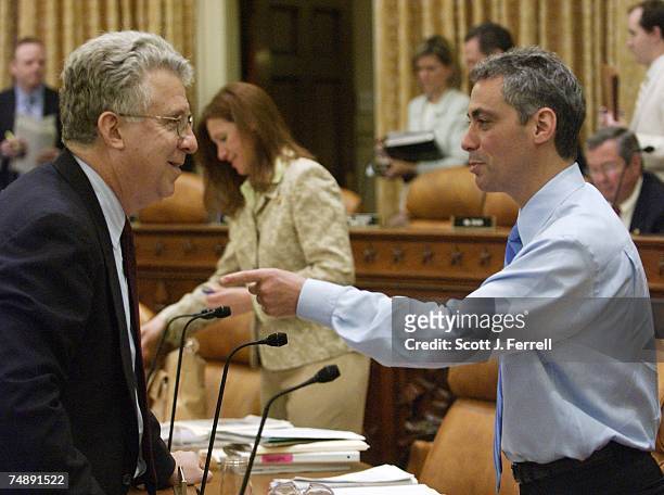 Robert C. Pozen, chairman of MFS Investment Management, and Rep. Rahm Emanuel, D-Ill., talk before the Ways and Means hearing on social security....