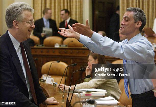 Robert C. Pozen, chairman of MFS Investment Management, and Rep. Rahm Emanuel, D-Ill., talk before the Ways and Means hearing on social security....