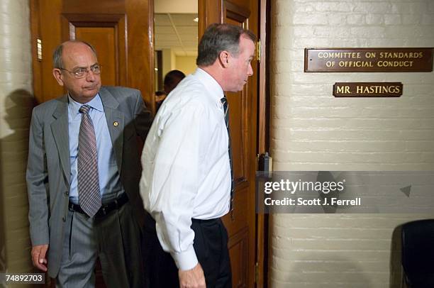 Chairman Doc Hastings, R-Wash., emerges with aide Ed Cassidy after House Speaker J. Dennis Hastert testified Tuesday for more than two and half hours...