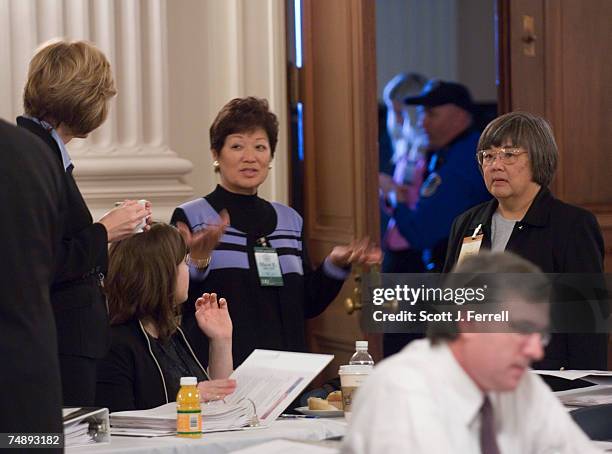 Rep.-Elect Betty Sutton , far left, Rep.-Elect Mazie K. Hirono , middle, and other representatives-elect and aides at the start of the House...