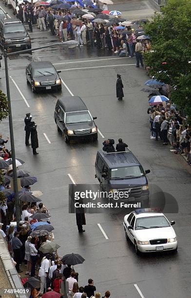 The hearse containing the coffin of former President Ronald Reagan makes its way along 22nd Street N.W. On the way to the National Cathedral, where a...