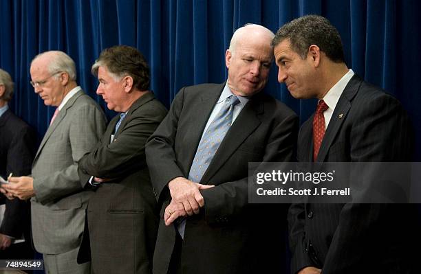 Rep. Christopher Shays, R-Conn., Rep. Martin T. Meehan, D-Mass., Sen. John McCain, R-Ariz., and Sen. Russell Feingold, D-Wis., during a news...