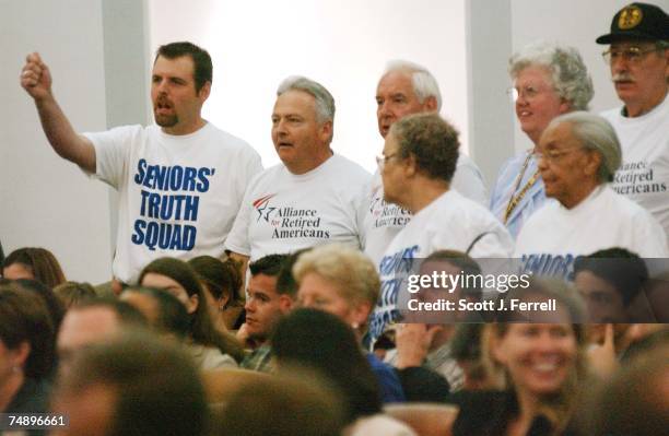 Protesters inturrupt Chairman Bill Thomas' opening statement, shouting, "We're blowing the whistle! Don't privatize Medicare!" during the markup of...