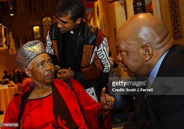 Chairman Elijah Cummings, D-Md., right, listens to 1964 Delegate Victoria Jackson Gray Adams tell her story during a "Fannie Lou Hamer" reception at...