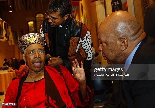 Chairman Elijah Cummings, D-Md., right, listens to 1964 Delegate Victoria Jackson Gray Adams tell her story during a "Fannie Lou Hamer" reception at...