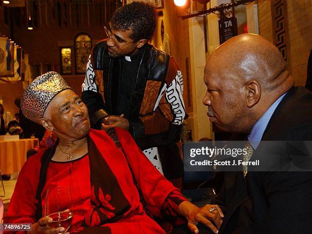 Chairman Elijah Cummings, D-Md., right, listens to 1964 Delegate Victoria Jackson Gray Adams tell her story during a "Fannie Lou Hamer" reception at...