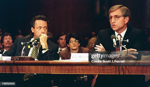 Terry Garcia, acting assistant secretary of Commerce, National Oceanic and Atmospheric Administration, left, looks on as Gov. Marc Racicot, R-Mont.,...