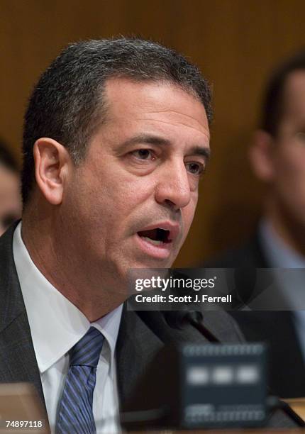 Sen. Russ Feingold, D-Wis., chairs a Senate Judiciary hearing titled "Exercising Congress' Constitutional Power to End a War." Witnesses were: David...