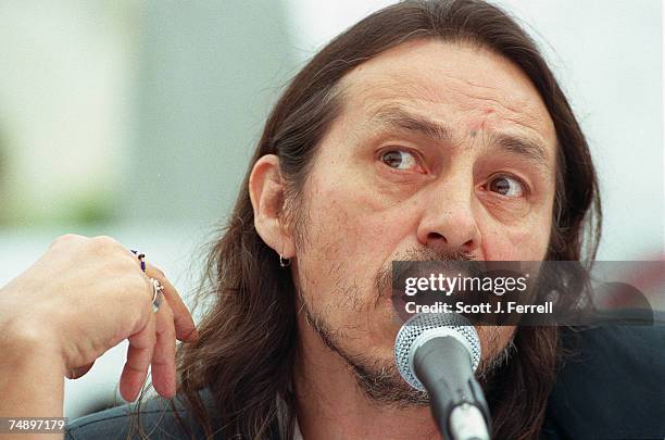 Native American poet and performing artist John Trudell makes a statement at a press conference on the West Terrace of the Capitol in opposition to...