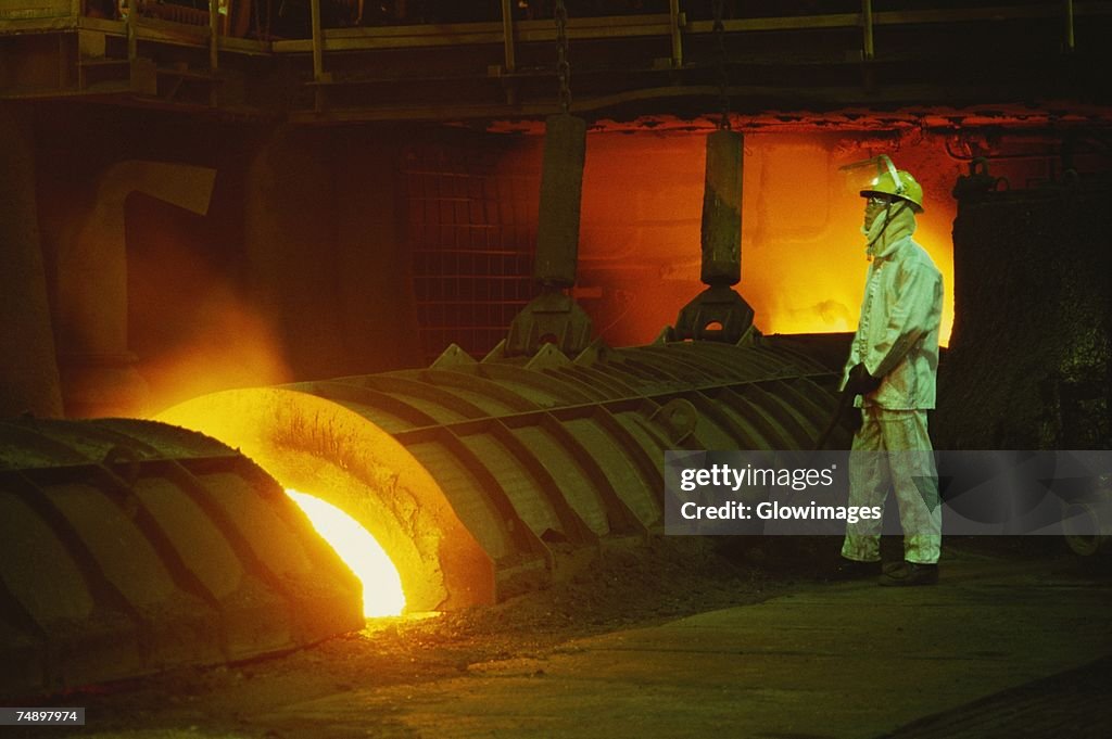 Side profile of a male worker working in a steel mill, Kawasaki, Honshu, Japan