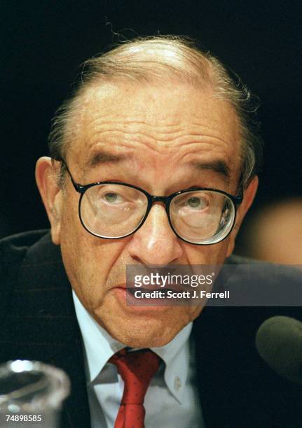 Federal Reserve Chairman Alan Greenspan testifies before the Joint Economic Committee during a hearing on general monetary policy oversight, focusing...