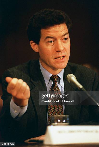 Sen. Sam Brownback, R-Kan., testifies before the Senate Banking, Housing and Urban Affairs Committee during a hearing on implementing the Iran-Lybia...