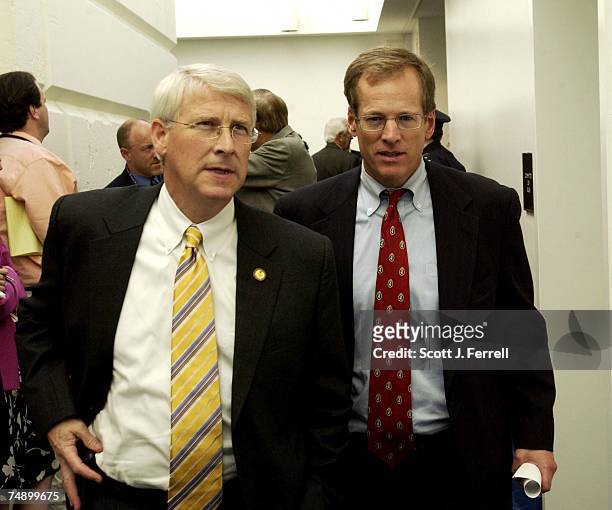 Roger Wicker, R-Miss., and Jack Kingston, R-Ga., leave the GOP conference after the indictment of Majority Leader Tom DeLay, R-Texas, by a Texas...