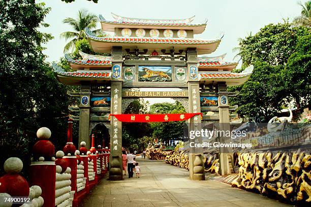 entrance of a theme park, haw par villa, singapore - theme park singapore stock pictures, royalty-free photos & images