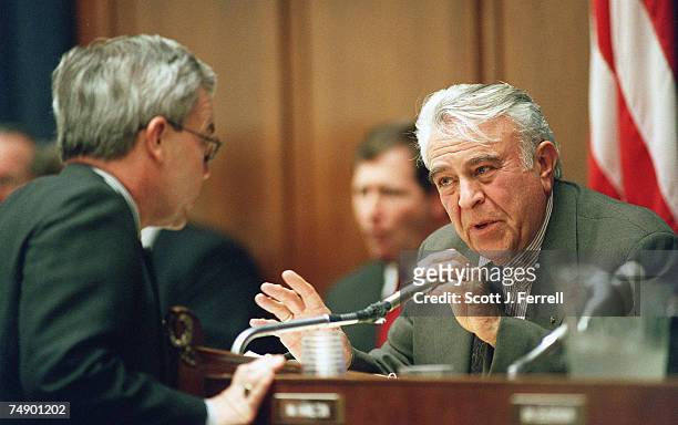 Bob Clement, D-Tenn., left, and Chairman Benjamin A. Gilman, R-N.Y., consult during a hearing on the implementation of the U.S.-China nuclear...