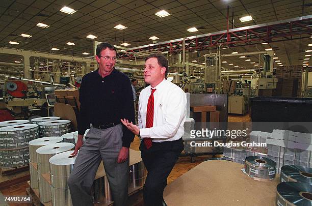 Joe Inman Vice President Manufacturing of RJ Reynolds tobacco company and Richard M. Burr,R-N.C., talk about the tobacco industry during a plant tour...
