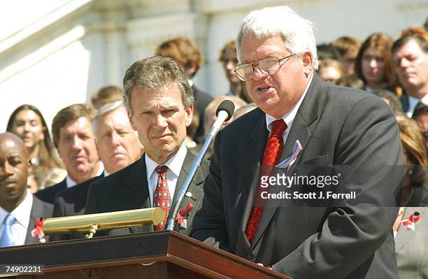 Senate Minority Leader Tom Daschle, S-S.D., and House Speaker J. Dennis Hastert, R-Ill., introduce the singing of "God Bless America" during the...