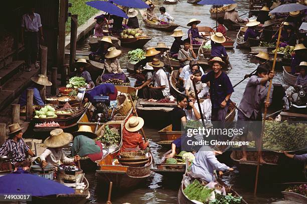 high angle view of a floating market, bangkok, thailand - floating markets bangkok stock pictures, royalty-free photos & images