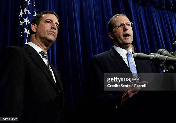 Sen. Russell D. Feingold, D-Wis., and Sen. John E. Sununu, R-N.H., during a news conference after nearly-unanimous Senate Democrats, joined by a...