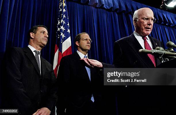 Sen. John E. Sununu, R-N.H., Sen. Russell D. Feingold, D-Wis., and Senate Judiciary ranking Democrat Patrich J. Leahy, D-Vt., leave a news conference...