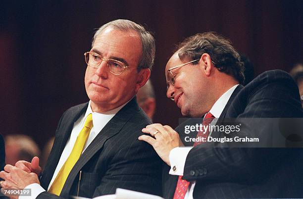 Dick Scruggs attorney from Mississippi and John D. Raffaelli lobbyist talk during the Senate Commerce,Science and Transportation Committee mark up of...