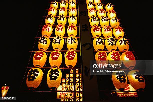 low angle view of japanese lanterns lit up in a traditional festival, akita prefecture, japan - akita prefecture stock pictures, royalty-free photos & images