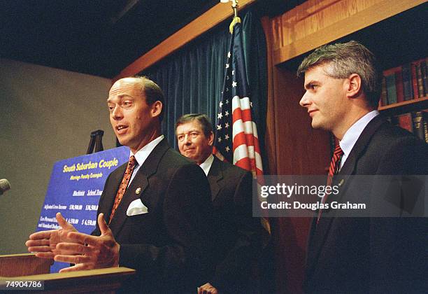 Jerry Weller,R-Ill.,John Ashcroft,R-Mo., and David M. McIntosh,R-Ind., during the news conference on the budget resolution and the marriage penalty.