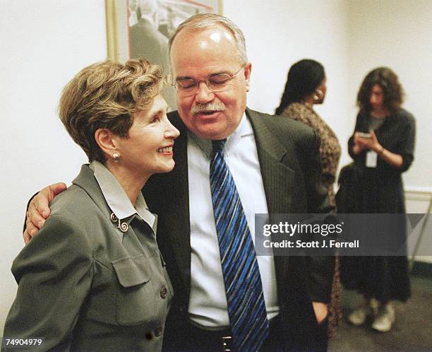 Connie Morella, R-Md., and National Education Association president Bob Chase, talk after a news conference calling for "common-sense gun control...