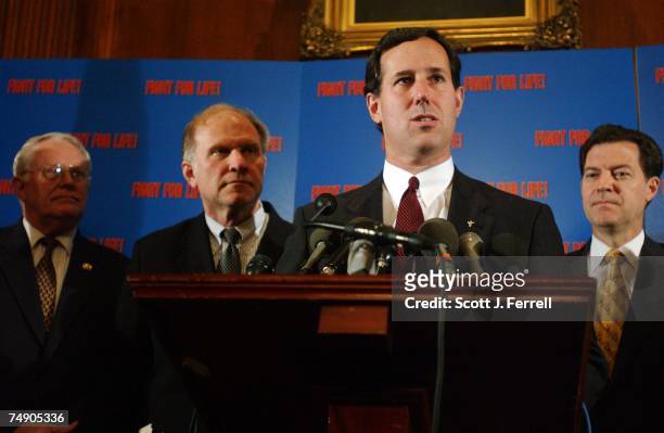 Rep. Joe Pitts, R-Pa., Rep. Steve Chabot, R-Ohio, and Sen. Rick Santorum, R-Pa., and Sen. Sam Brownback, R-kan., during a news conference after the...