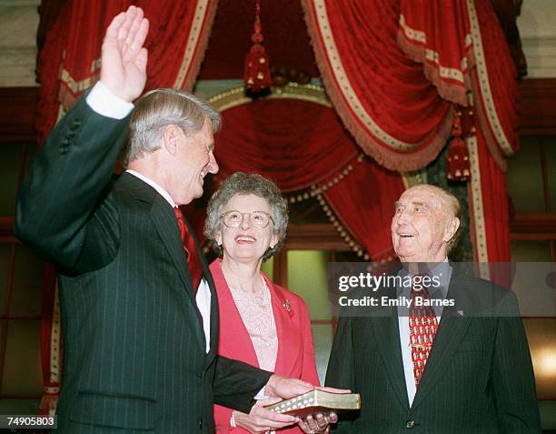 New Senator Zell Miller, R-Ga., who replaces the late Sen. Paul Coverdell, his wife, Shirley, and Sen. Strom Thurmond reenact Miller's swearing-in...