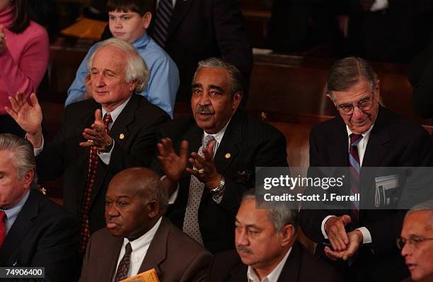 109th CONGRESS/HOUSE SWEARING-IN--Sander Leven, D-Mich., Charles B. Rangel, D-N.Y., and Pete Stark, D-Calif., applaud during a remembrance of Robert...