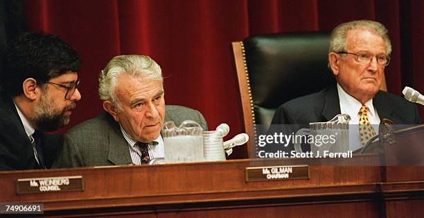 Counsel Hillel Weinberg, left, talks with International Relations Chairman Benjamin Gilman, R-N.Y., during a joint hearing of the House National...