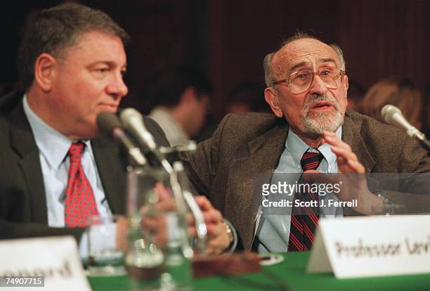 Michael E. Levine, law professor at Harvard Law School, and Alfred E. Kahn, economics professor at Cornell University, testify before Senate...