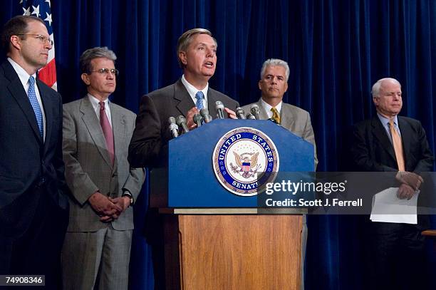 Sen. John E. Sununu, R-N.H., Sen. Tom Coburn, R-Okla., Sen. Lindsey Graham, R-S.C., Sen. John Ensign, R-Nev., and Sen. John McCain, R-Ariz., during a...