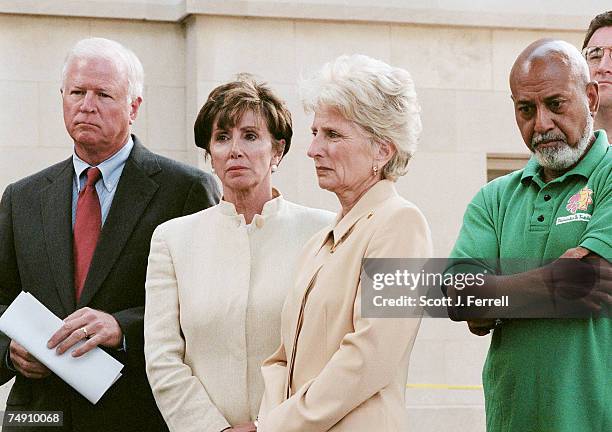 Members of the Speaker's working group on terrorism and homeland security wait to talk to the media outside U.S. Capitol Police Headquarters around 2...