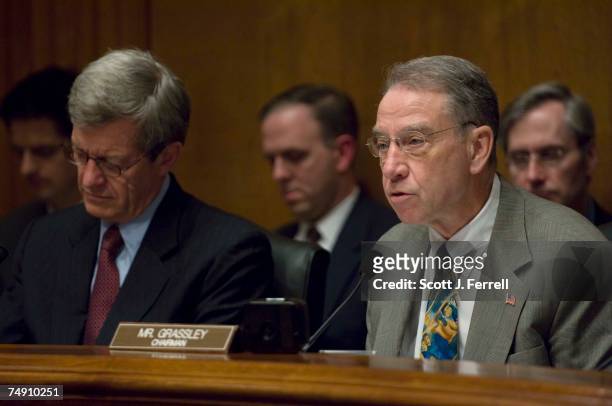 Ranking member Max Baucus, D-Mont., and Chairman Charles E. Grassley, R-Iowa, during the Senate Finance hearing on Susan C. Schwab's nomination to be...