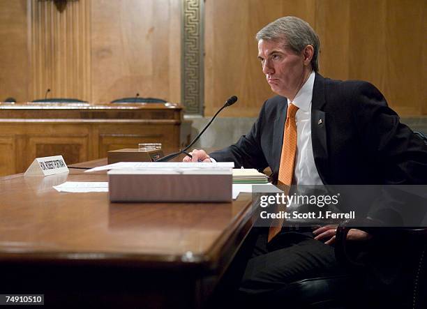 Rob Portman testifies before the Senate Homeland Security and Governmental Affairs Committee during his second appearance before a Senate committee...