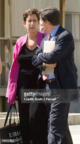 House of Representatives General Counsel Geraldine Gennet, in purple, exits E. Barrett Prettyman U.S. Courthouse after presenting arguments to Chief...