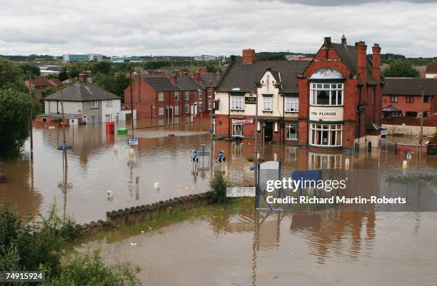 View of submerged streets following flooding in the Catcliffe area of Rotherham half a mile from the cracked Ulley Dam, on June 26, 2007 in...