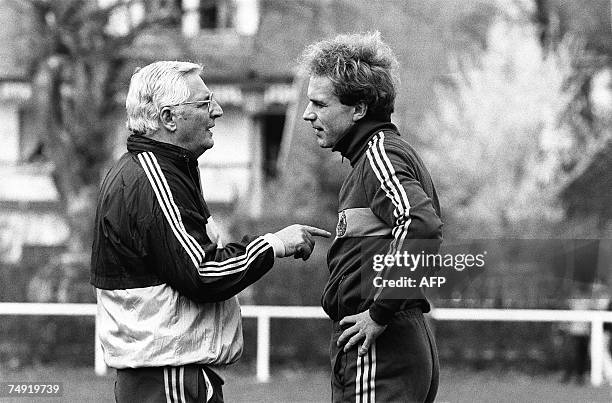 File photo dated 18 April 1984 shows German football coach Josef "Jupp" Derwall speaking with German player Karl-Heinz "Kalle" Rummenigge during a...