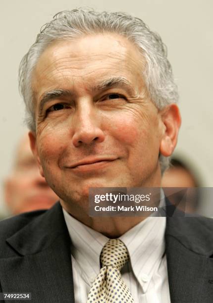 Securities and Exchange Commission member Roel Campos participates in a House Financial Services Committee hearing on Capitol Hill June 26, 2007 in...