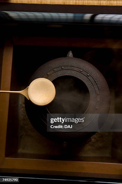 tea kettle and a bamboo dipper, high angle view, close up, japan - bamboo dipper photos et images de collection