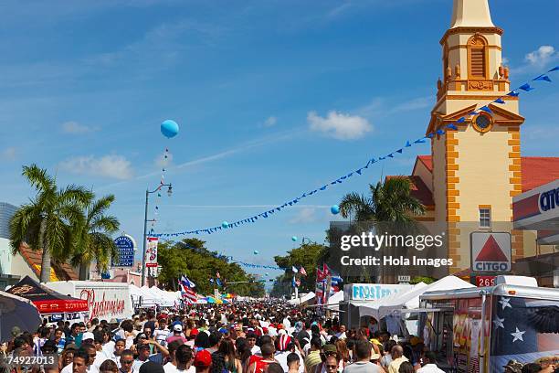 crowd at a carnival, little havana, miami, florida, usa - miami streets stock pictures, royalty-free photos & images