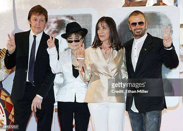 Sir Paul McCartney, Yoko Ono, Olivia Harrison and Ringo Starr pose during a commemorative plaque dedication ceremony for John Lennon and George...