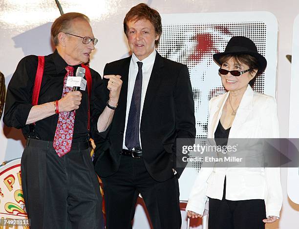 Talk show host Larry King, Sir Paul McCartney and Yoko Ono joke around at a commemorative plaque dedication ceremony for John Lennon and George...