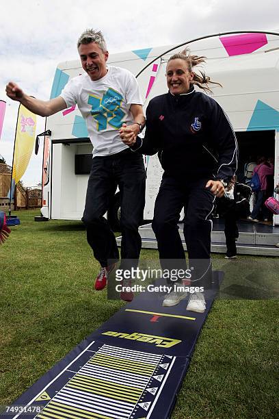 Jonathan Edwards and Karen Pickering demonstrate the standing jump during the London 2012 Roadshow at the Royal Norfolk Showground on June 27, 2007...