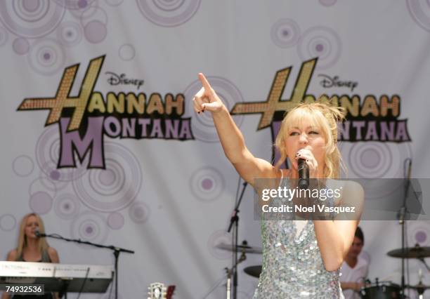 Singer Hannah Montana performs at a promotional concert for the release of her new DVD "Hannah Montana 2" at Hollywood & Highland on June 26, 2007 in...