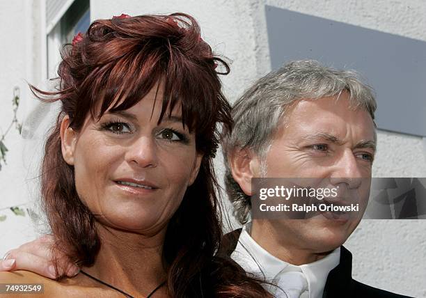 Singer Andrea Berg and her newly-wed husband Uli Ferber smile after their wedding ceremony on June 27, 2007 in Klein-Aspach near Heilbronn, Germany.