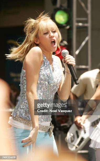 Singer Hannah Montana performs at a promotional concert for the release of her new DVD "Hannah Montana 2" at Hollywood & Highland on June 26, 2007 in...