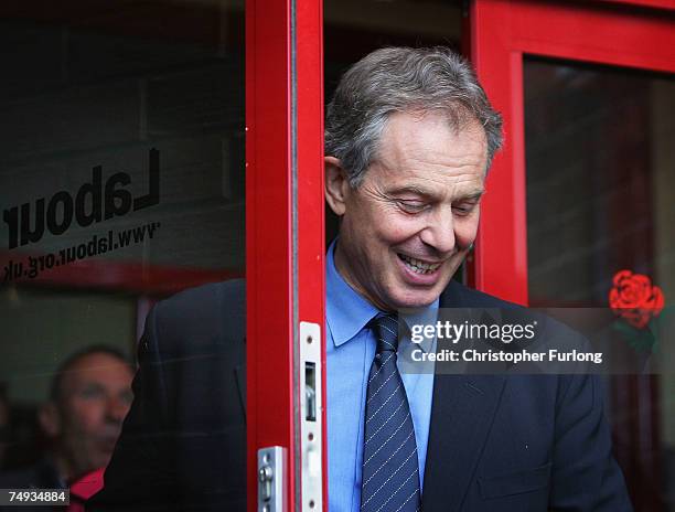 Britain's former Prime Minister Tony Blair leaves Trimdon Labour Club after formally handing in his resignation as the member of Parliament for...